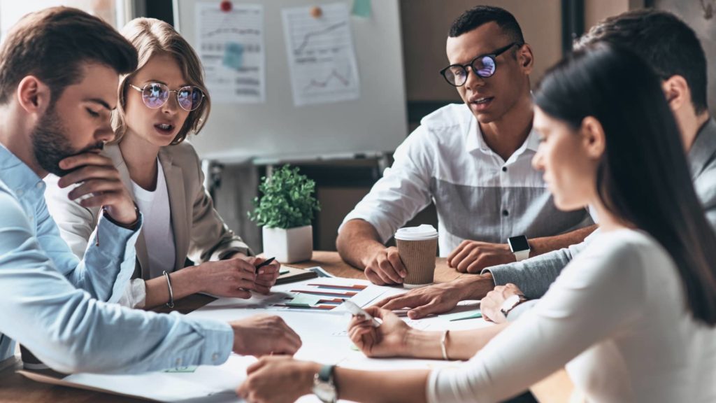 Group of People in Business Meeting working Together