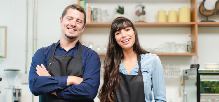 Small business owner reviewing financial records